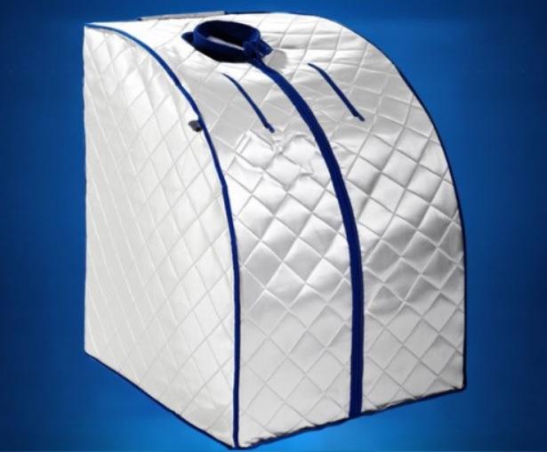 Transportabelt infrarødt saunatelt XL Deluxe foldet op med hoved stikkende ud